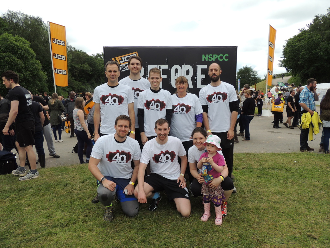 Chloe with her daughter & colleagues before the 2016 JCB Mud Run